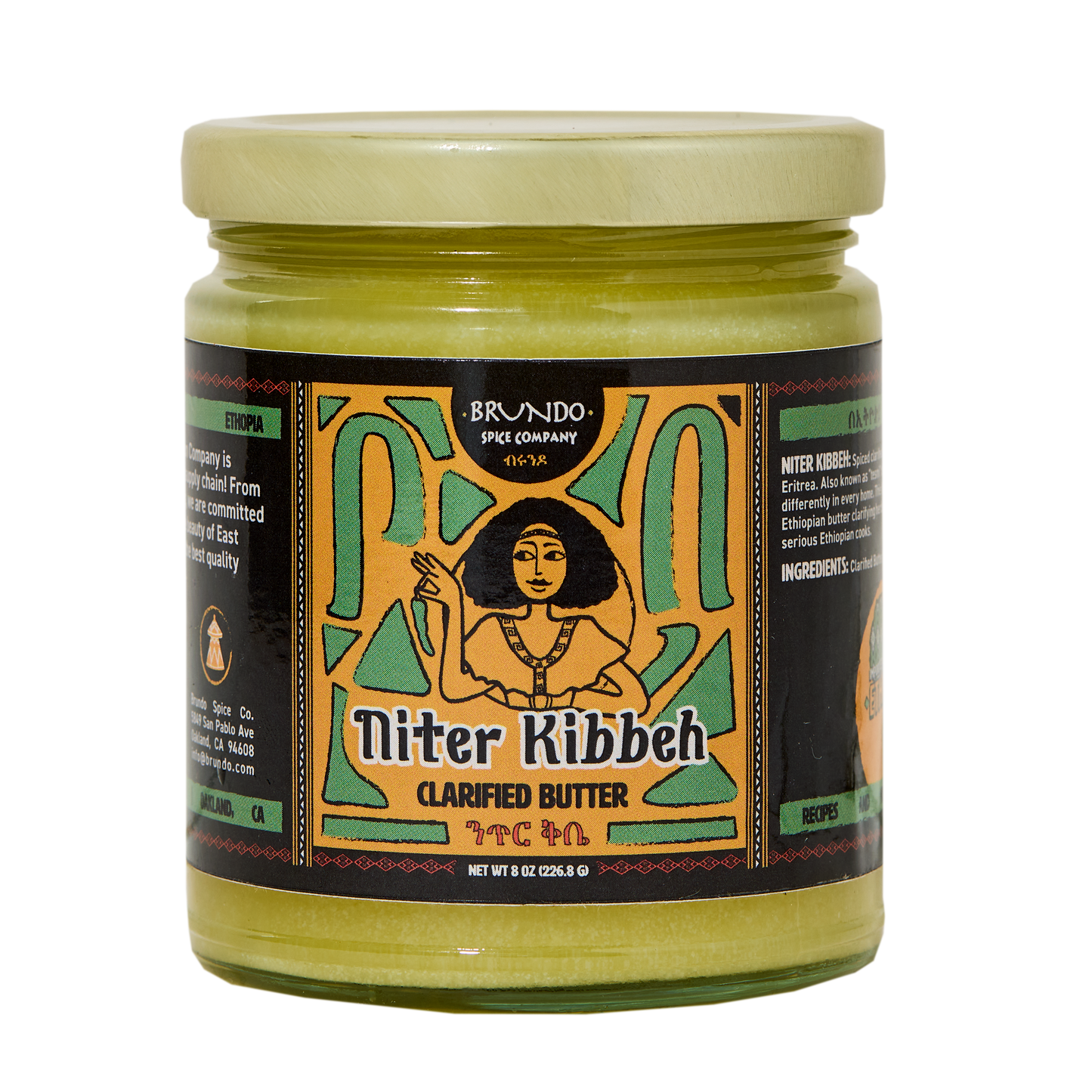 Brundo Spice Company Niter Kibbeh Ethiopian clarified butter jar placed on a bed of dried koseret and besobela herbs.