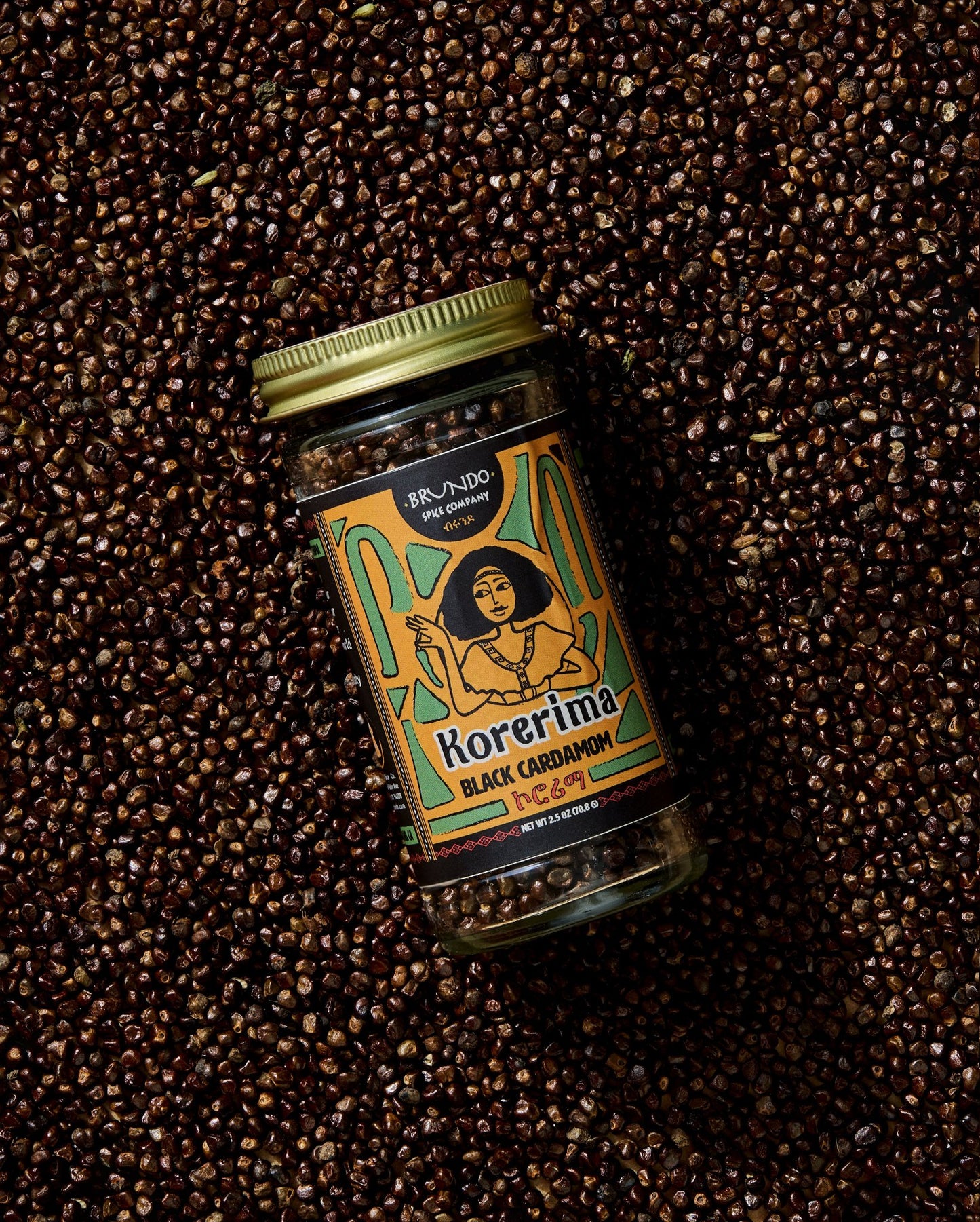 Close-up of finely ground wild turmeric powder with rich golden-orange tones.