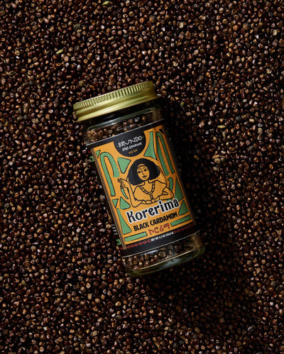 Close-up of finely ground wild turmeric powder with rich golden-orange tones.