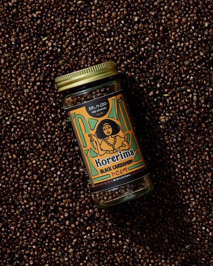 Close-up of finely ground wild turmeric powder with rich golden-orange tones.